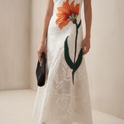 This strapless dress features wonderful details of…